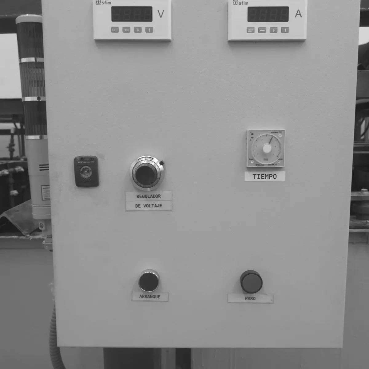 Control panel with digital voltage and current displays, timer and pushbuttons