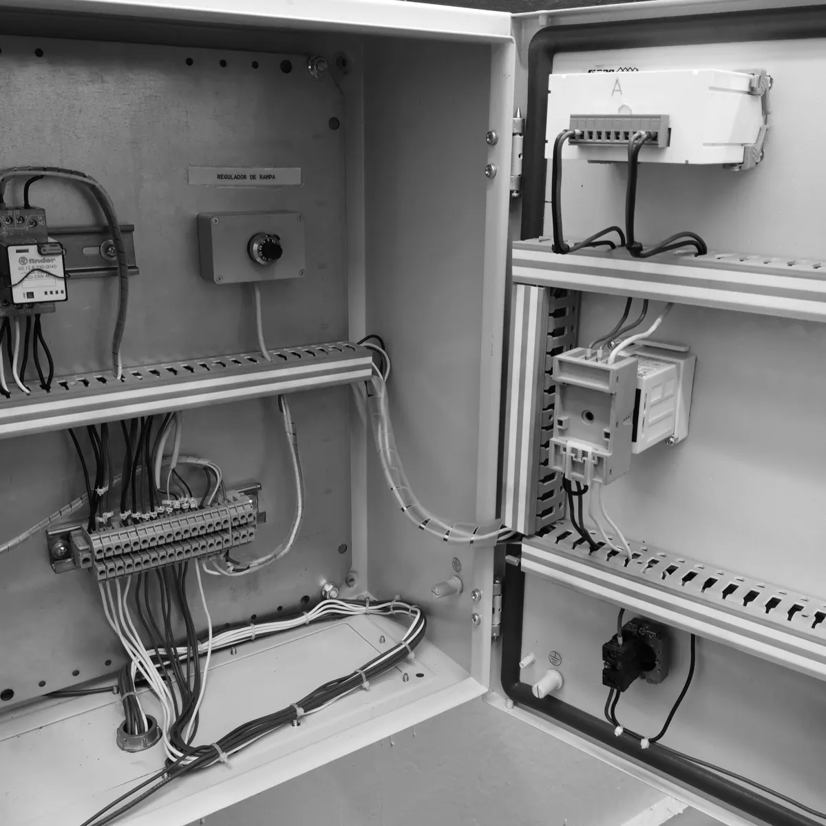 Inside a control cabinet, with its components mounted on DIN rail